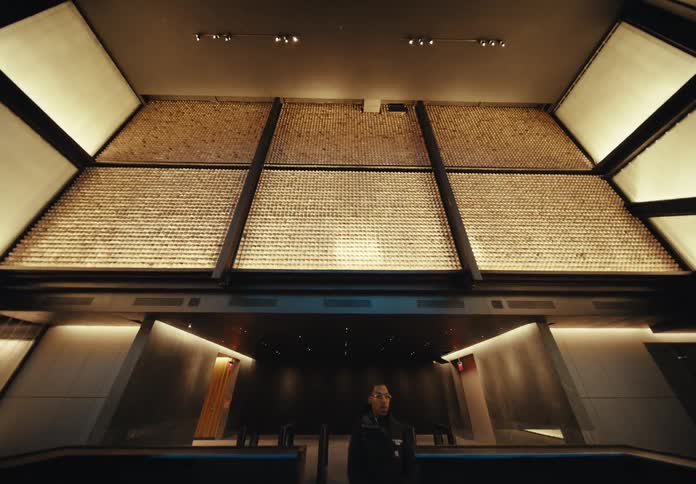 The lobby of a luxury hotel with golden walls