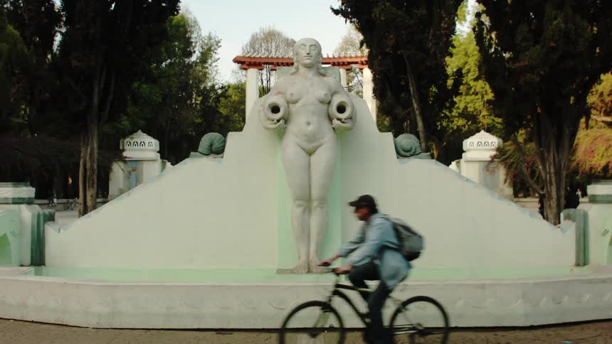 A historical monument in a neighborhood square