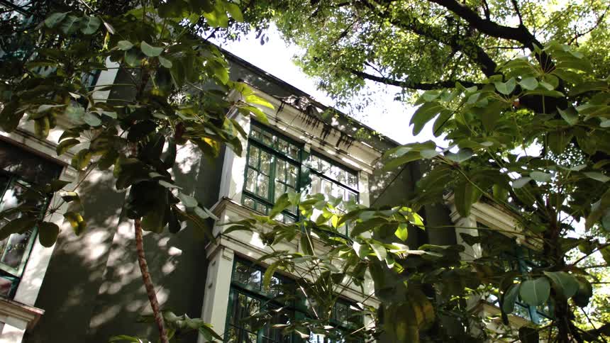 Exterior of a residential building in a quiet neighborhood during the day
