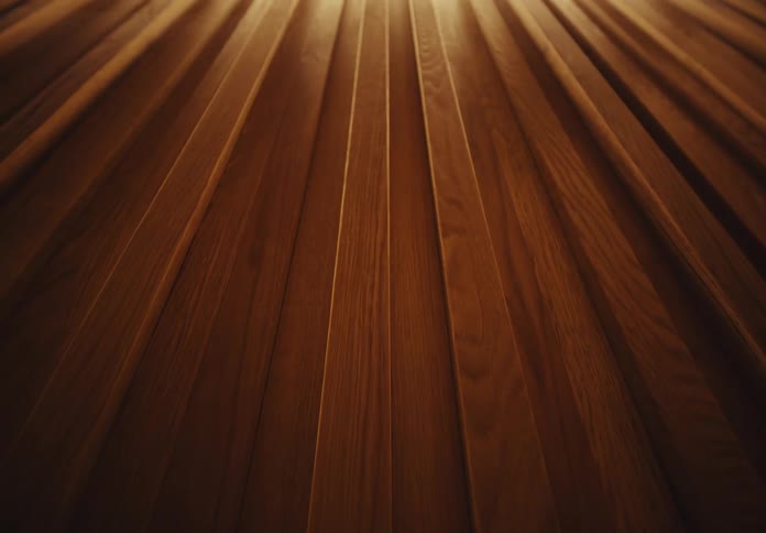 A light shines on a wall built from wood