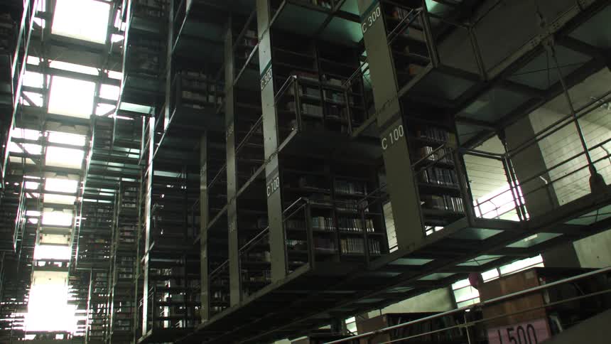 Library shelves under skylights rafters