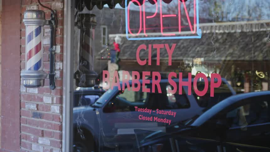 Outside of a city barber shop