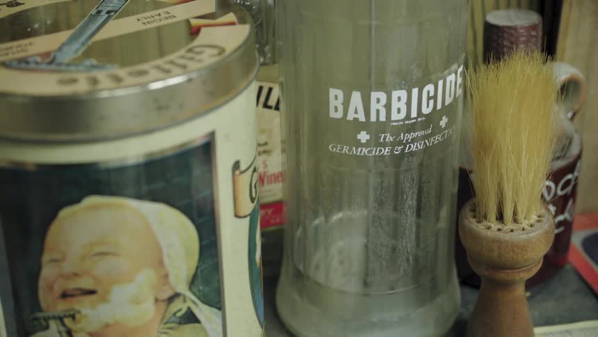 Barber tools sit atop a barbers tabletop