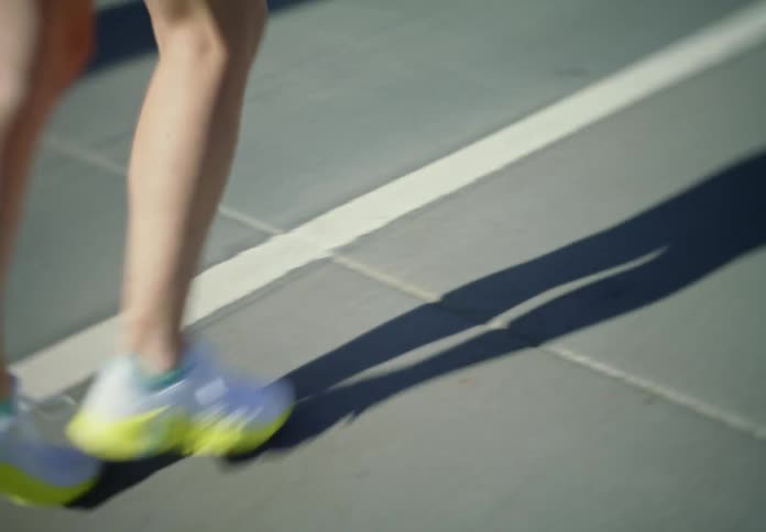A person doing an exercise during a sunny day