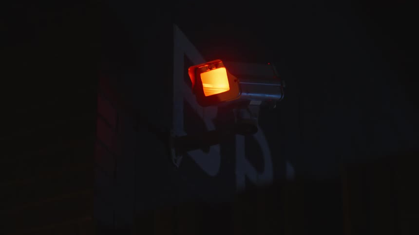A camera is on the side of the building