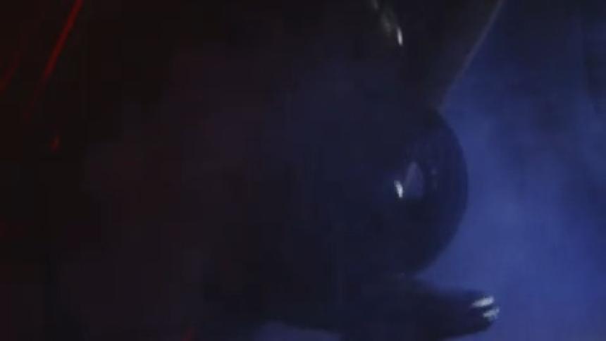 Exclusive on the pedal of a bicycle with a moving human foot at night