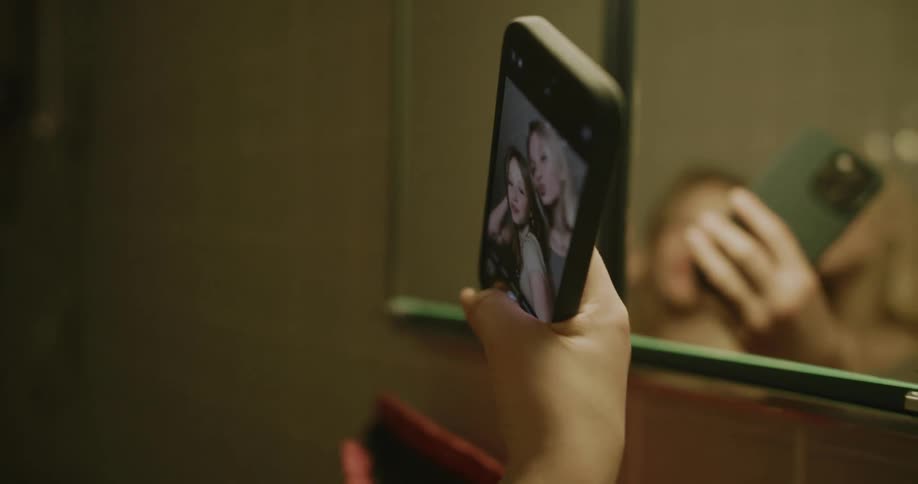 Two female friends taking a selfie video