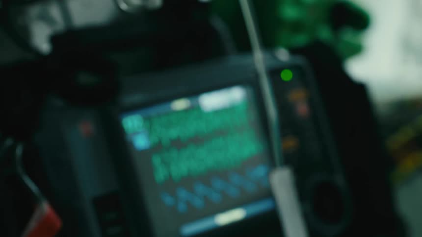 Patient sleeping on the stretcher and receiving the serum