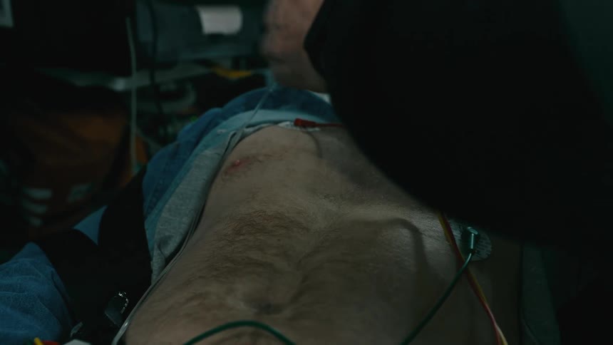 A patient is being treated in the ambulance