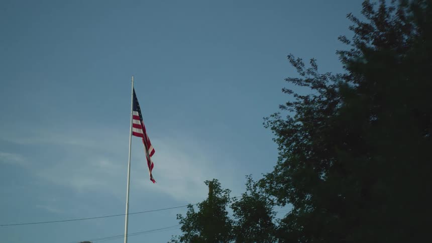A clip of the national flag and a wall