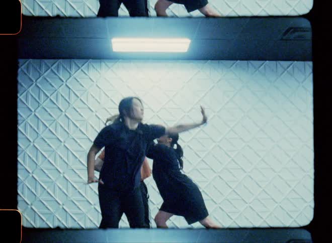 Three female teens break dancing indoor