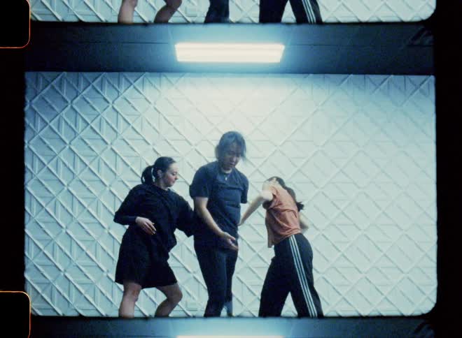 Women in a studio dancing a joint choreography
