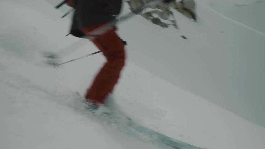 Skier riding on the snow during the day