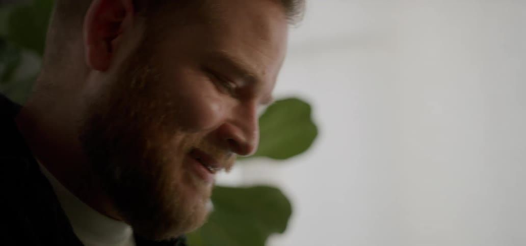 Portrait of a bearded man smiling