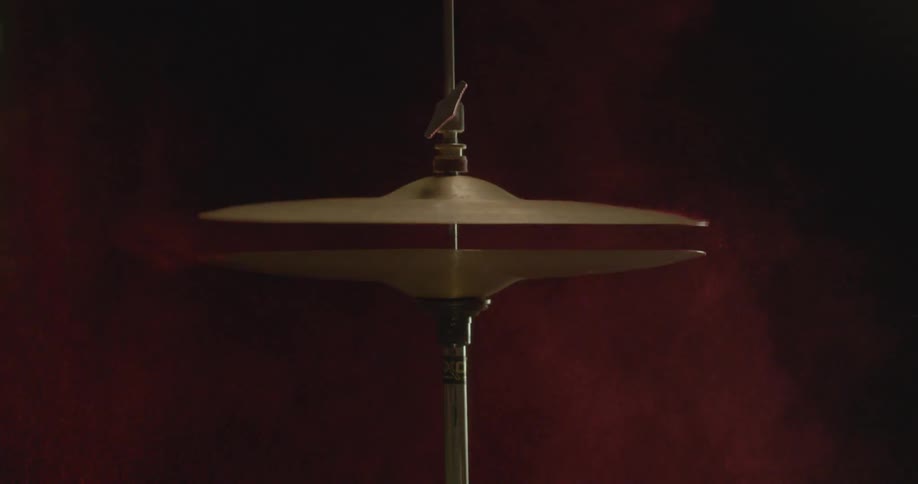 Drum cymbals emit a red powder when hit with a drumstick