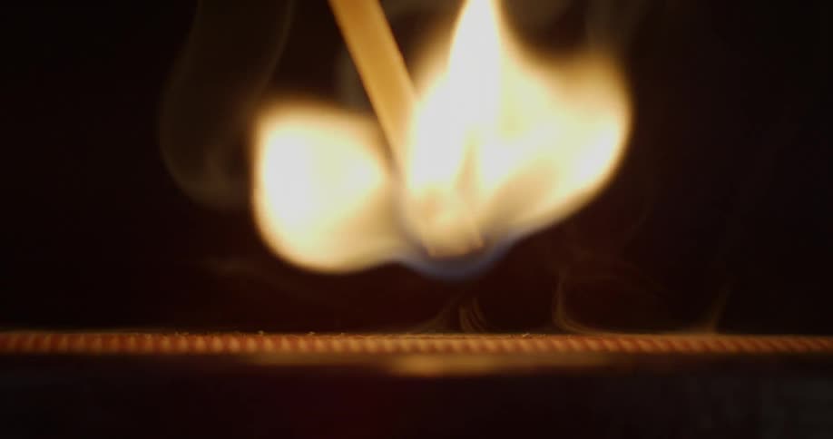 A matchstick is lit