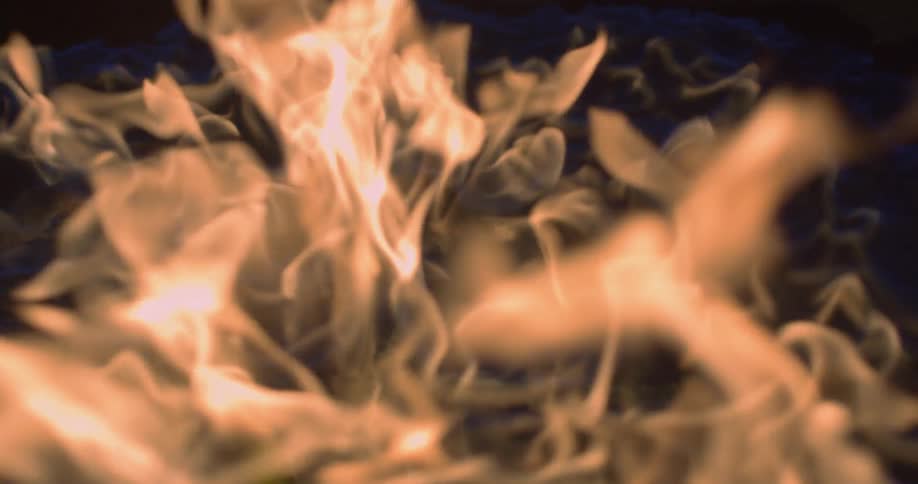 Flames are fluttering in the dark