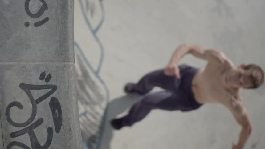 Person jumps up a wall and does a flip