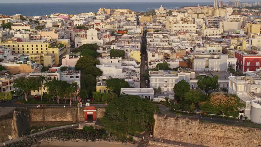 Aerial panorama of an urban city on an island surrounded by the sea