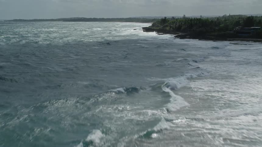 Aerial of a tropical island on a cloudy day