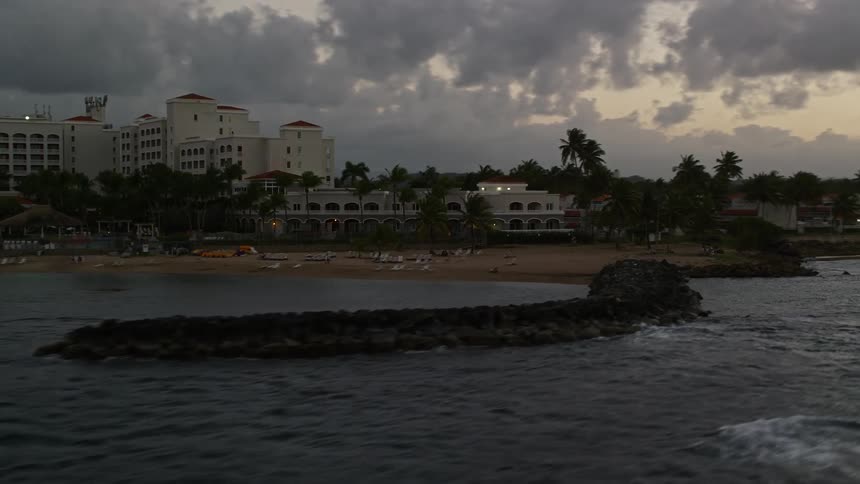 Aerial panorama of a seaside resort under a cloudy morning sky