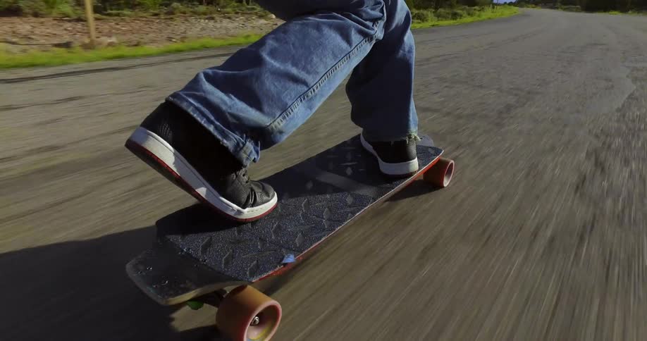 Person skating very fast down a hill