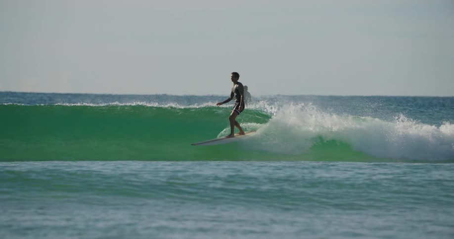 People are surfing in the ocean