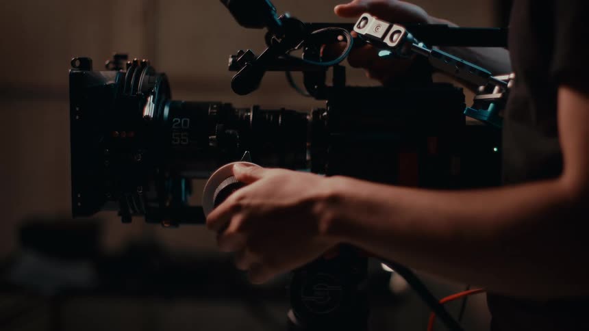 A man is recording with a camera
