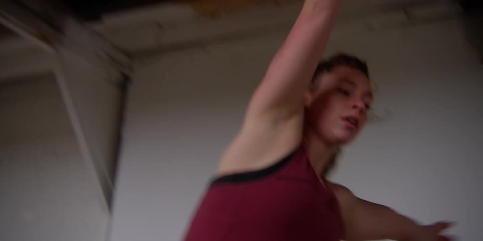 A young woman dances
