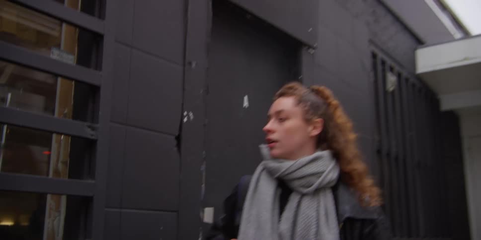 Woman opening the door and leaving