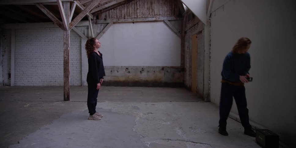 A clip of two females stretching