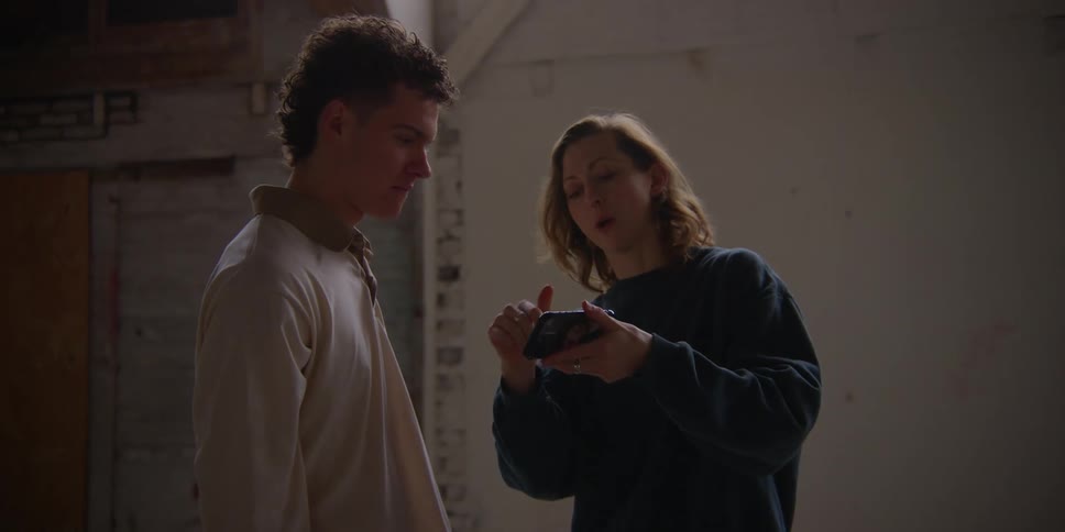 A clip of a male and a female having a conversation