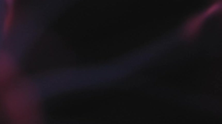 Wisps of electrical energy move in the darkness