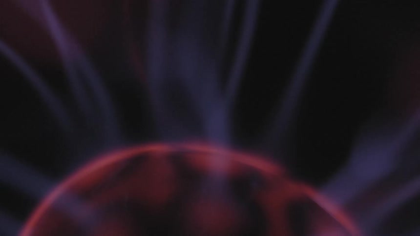 An orb contained in glass shoots electric bolts
