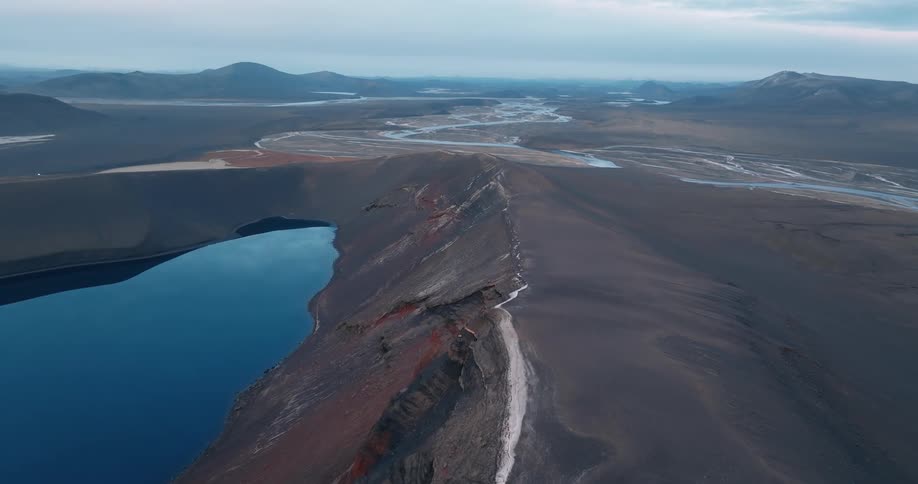 Aerial panorama of lakes amid craters and mountains