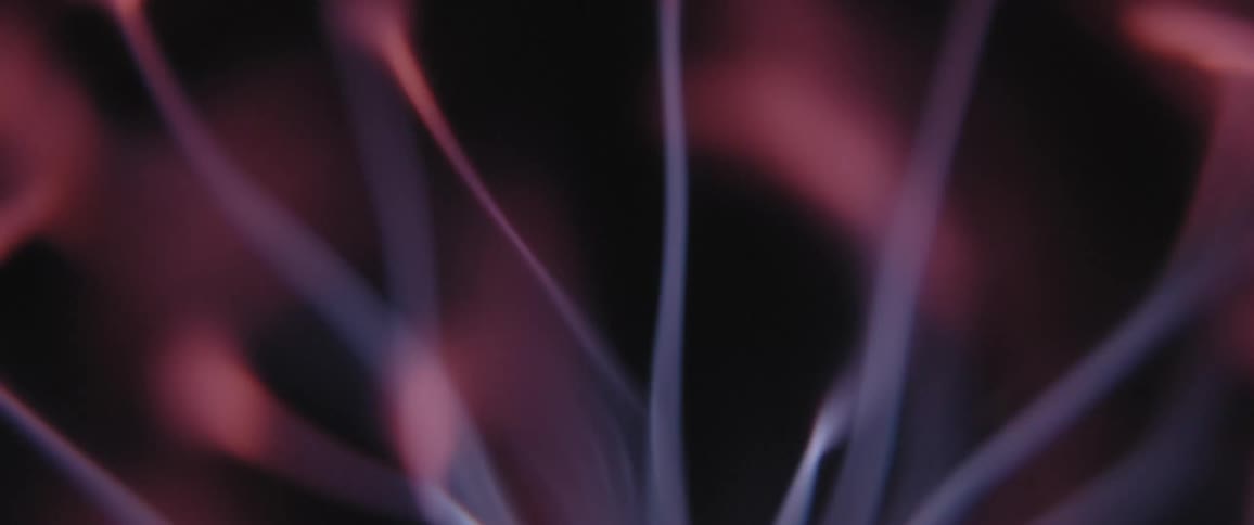 Blue bolts move about interior of plasma globe