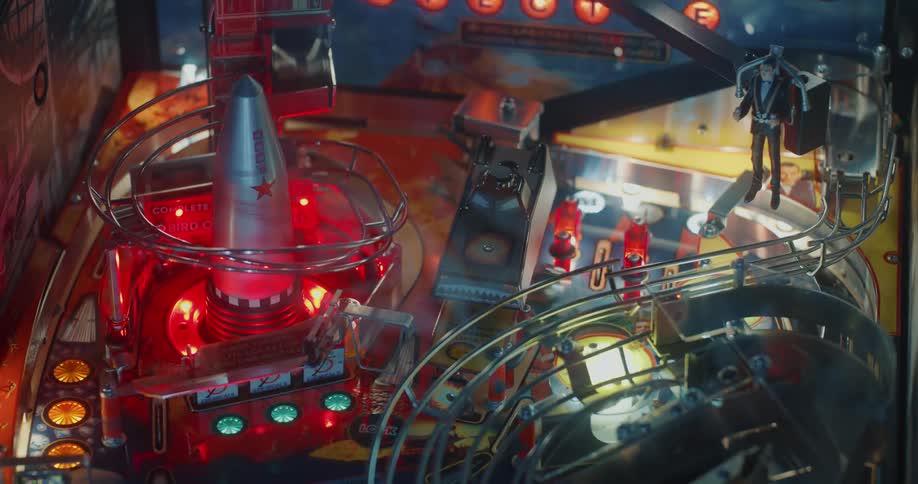 Closeup on a moving pinball machine