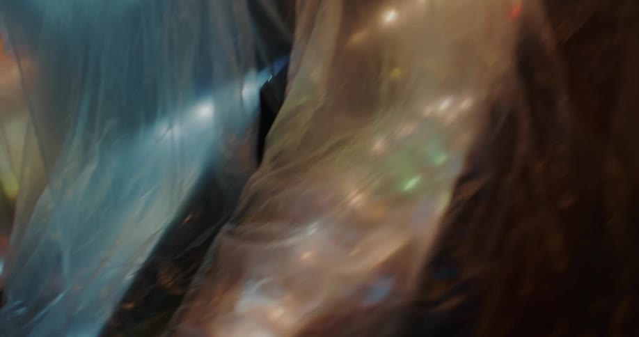 Rows of pinball machine light up under clear plastic covers