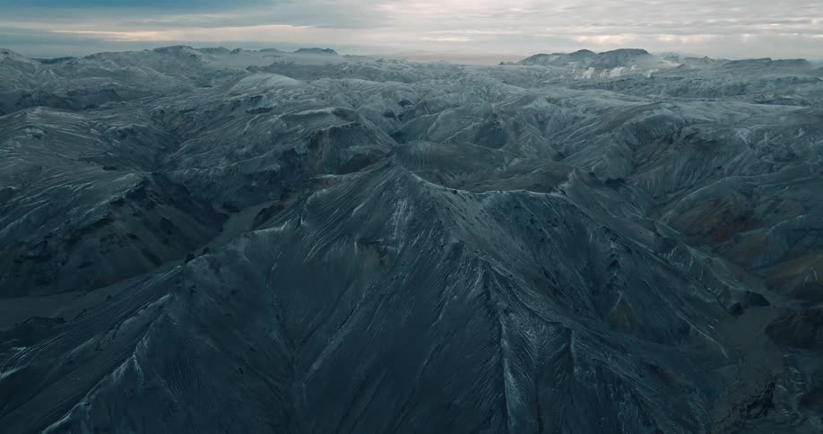The mountains are covered with snow and ice