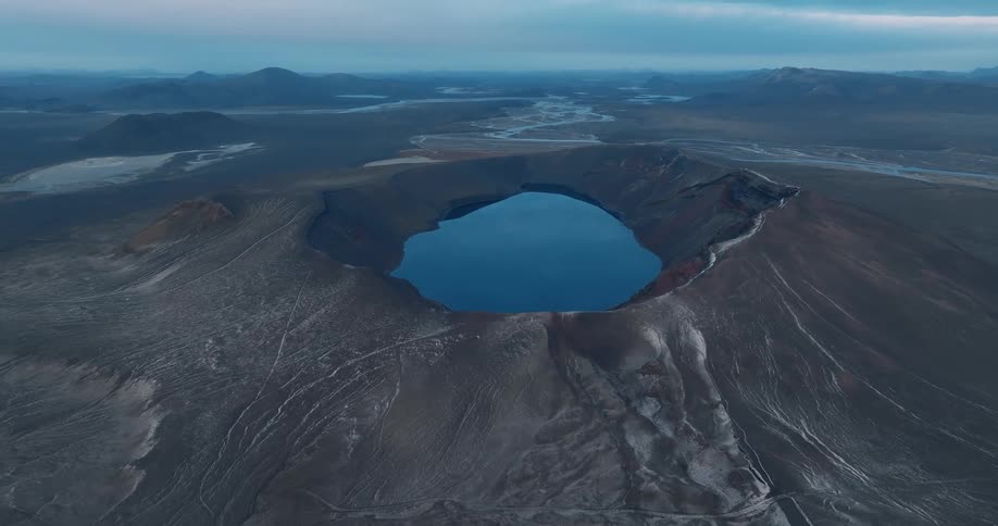 Aerial panorama of a crater with a lake inside