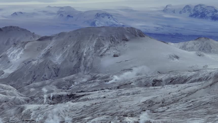 An aerial clip of an ice mountain in the arctic