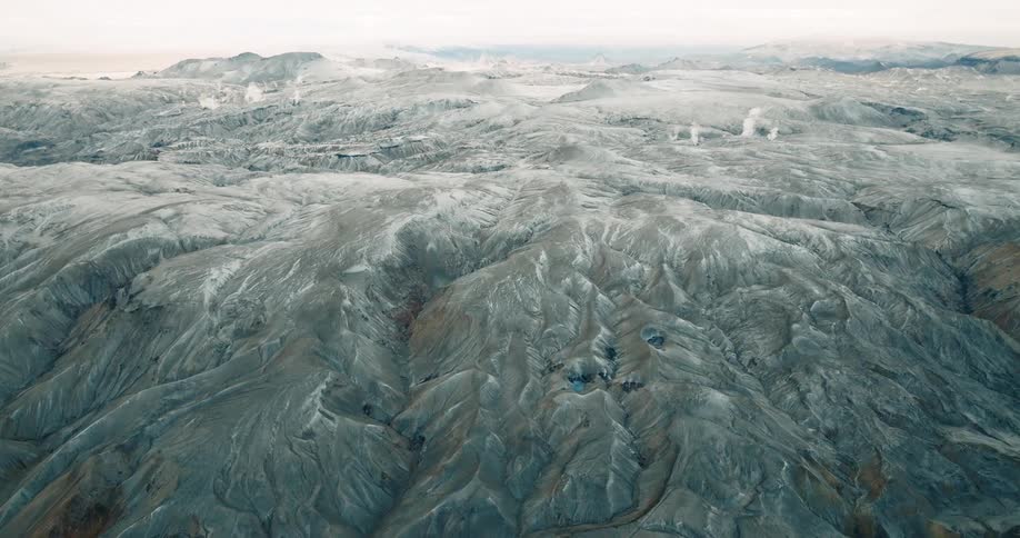Panorama of a geological rocky ground covered by snow