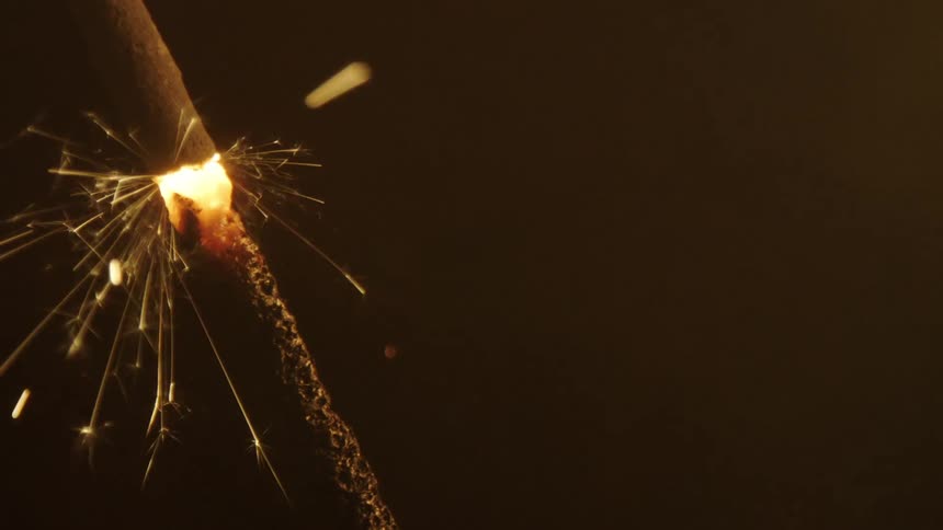 A spark stick slowly burning