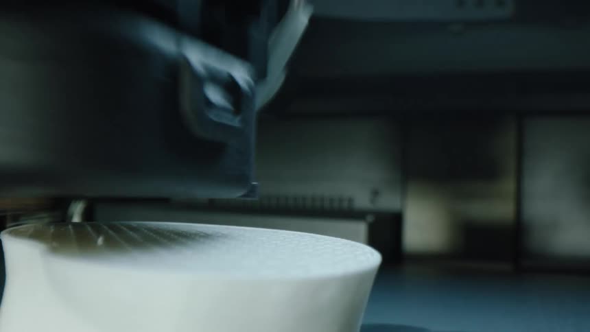 A 3d printing machine prints a sculpture