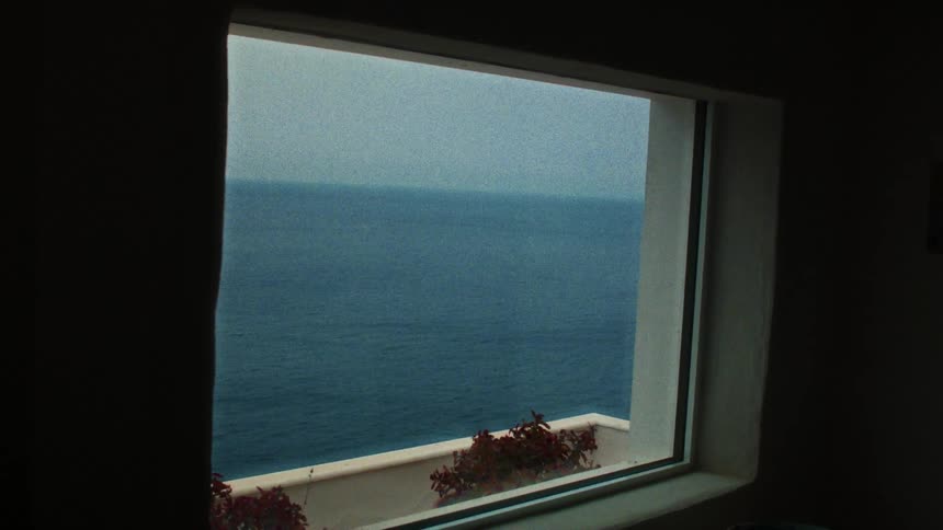 An ocean seen through a window