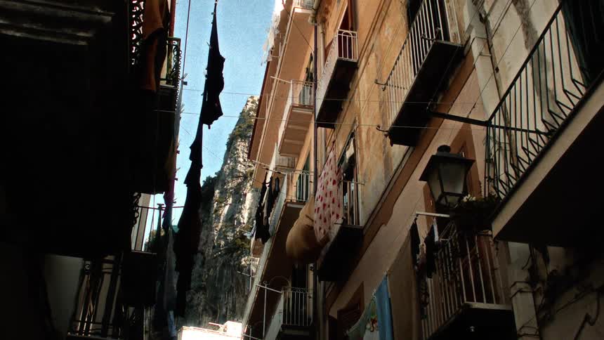 Upward view of complexes of precarious and residential buildings