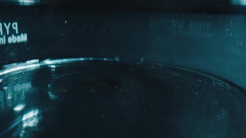 Water drips into a tank