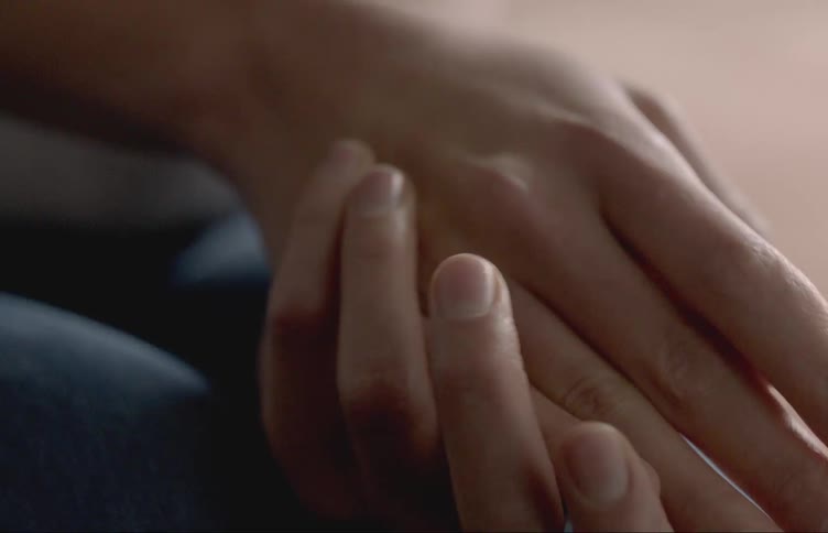 A person massaging both hands