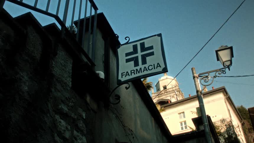 Closeup of a sign on a wall indicating pharmacy