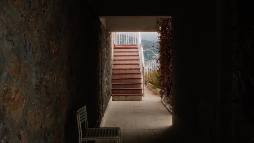 Hallway of a house with access to an external staircase